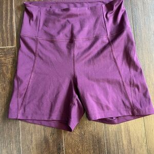 girlfriend collective High-Waist Bike Shorts in Plum